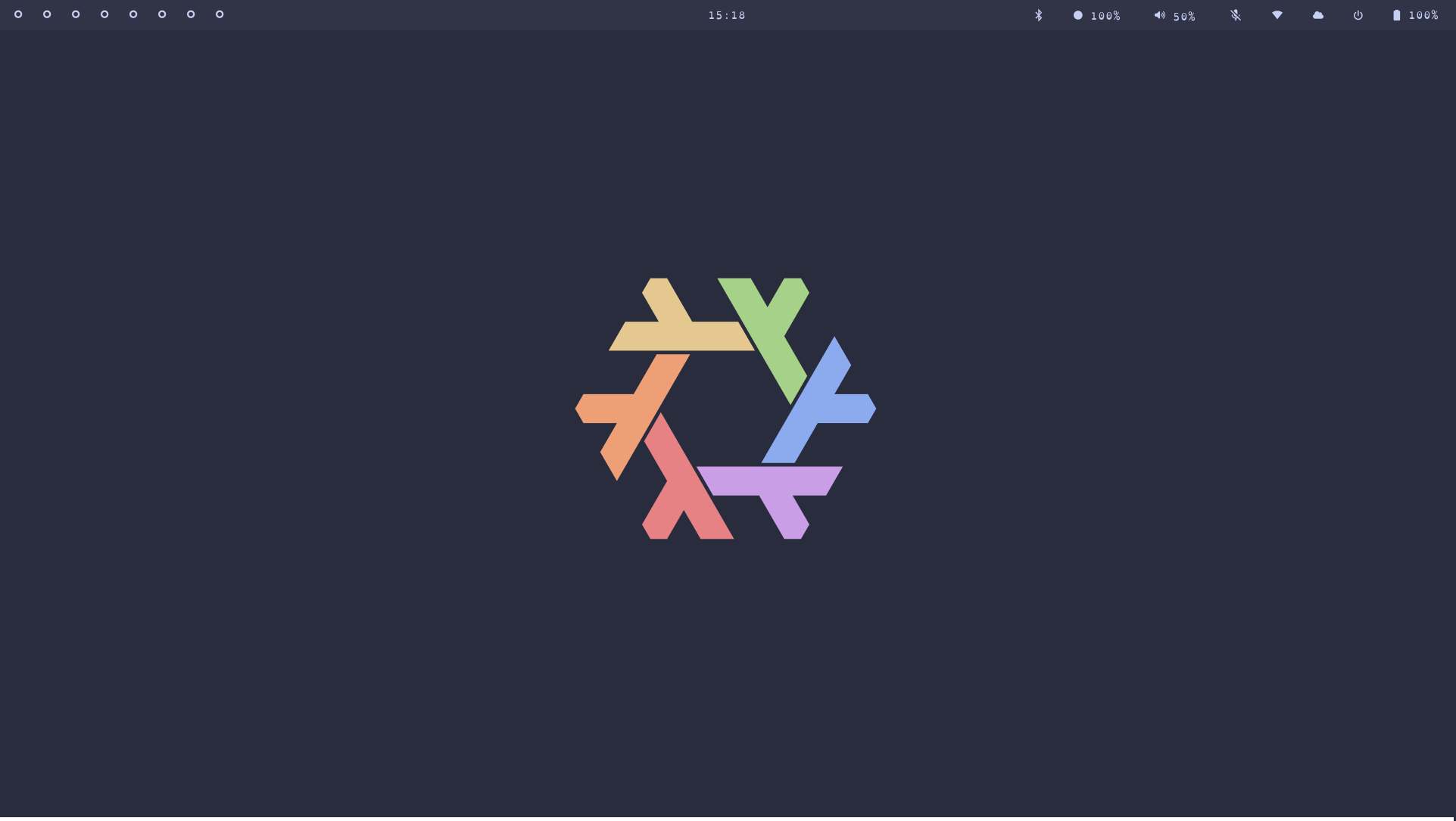 An empty desktop showing the NixOS logo as the wallpaper.